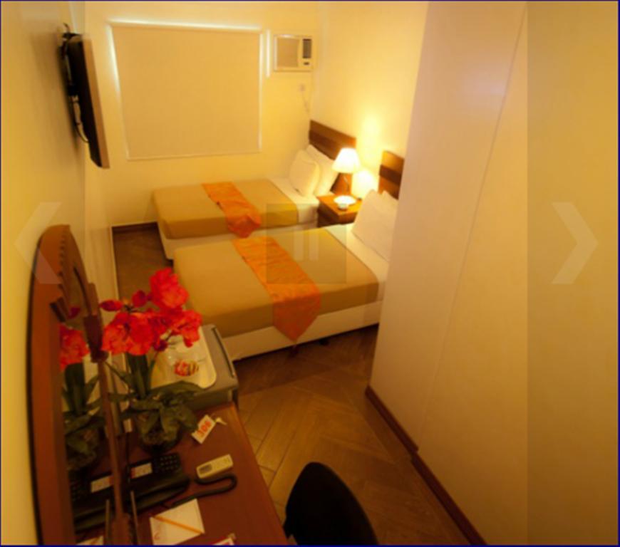 Avitel Hotel Makati City Rom bilde