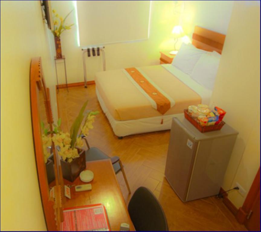 Avitel Hotel Makati City Rom bilde