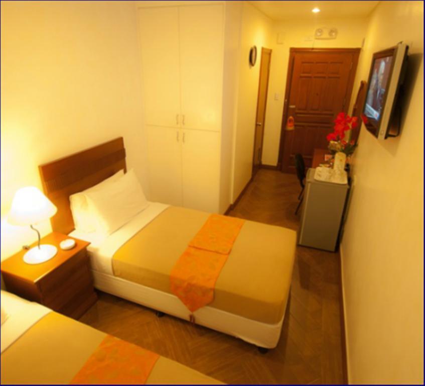 Avitel Hotel Makati City Rom bilde